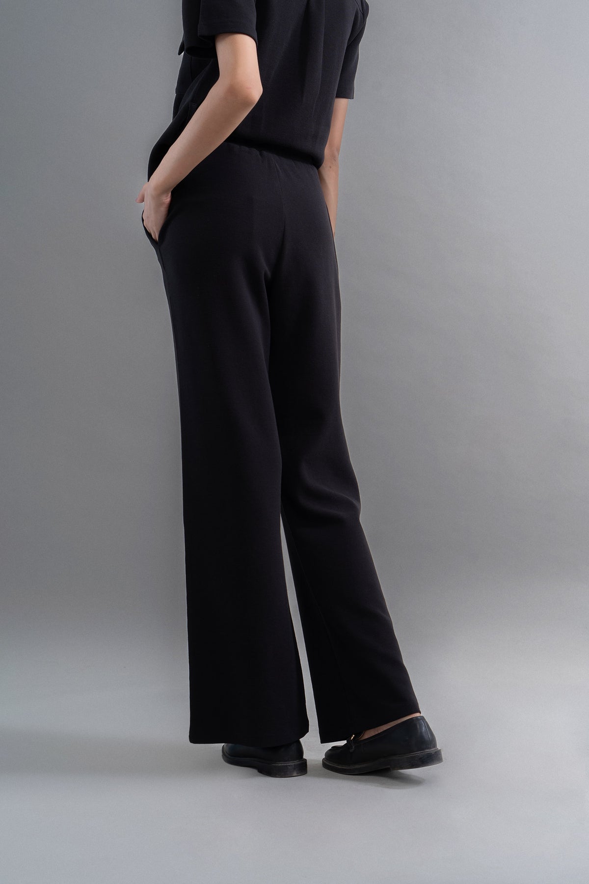 Lushknit® 2.0 black straight multitask pants for versatile styling.