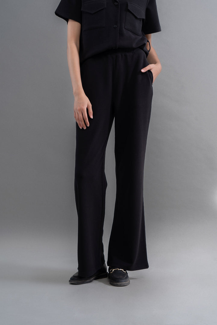 Lushknit® 2.0 black straight multitask pants displayed on a model.