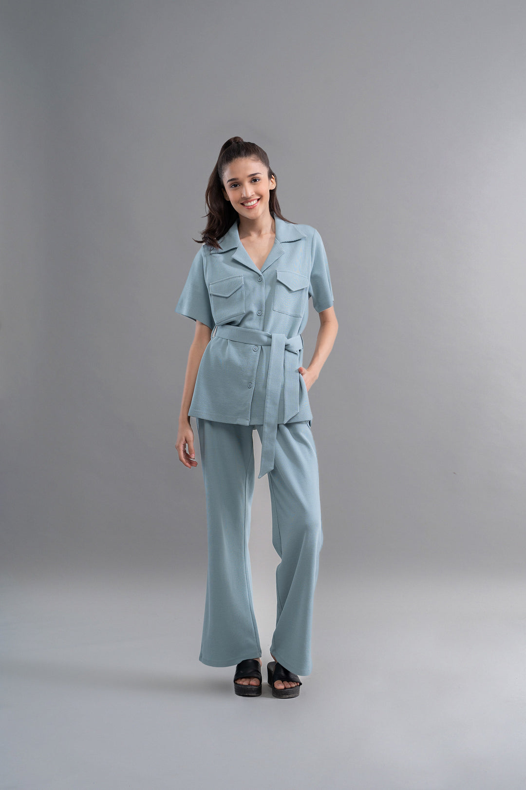 Model wearing Safari Lushknit® 2.0 Aqua Shirt set in soft blue.