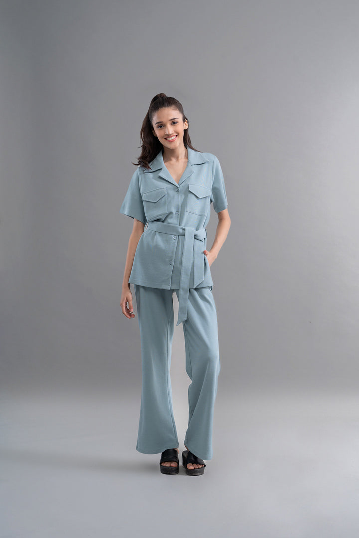 Model wearing Safari Lushknit® 2.0 Aqua Shirt set in soft blue.