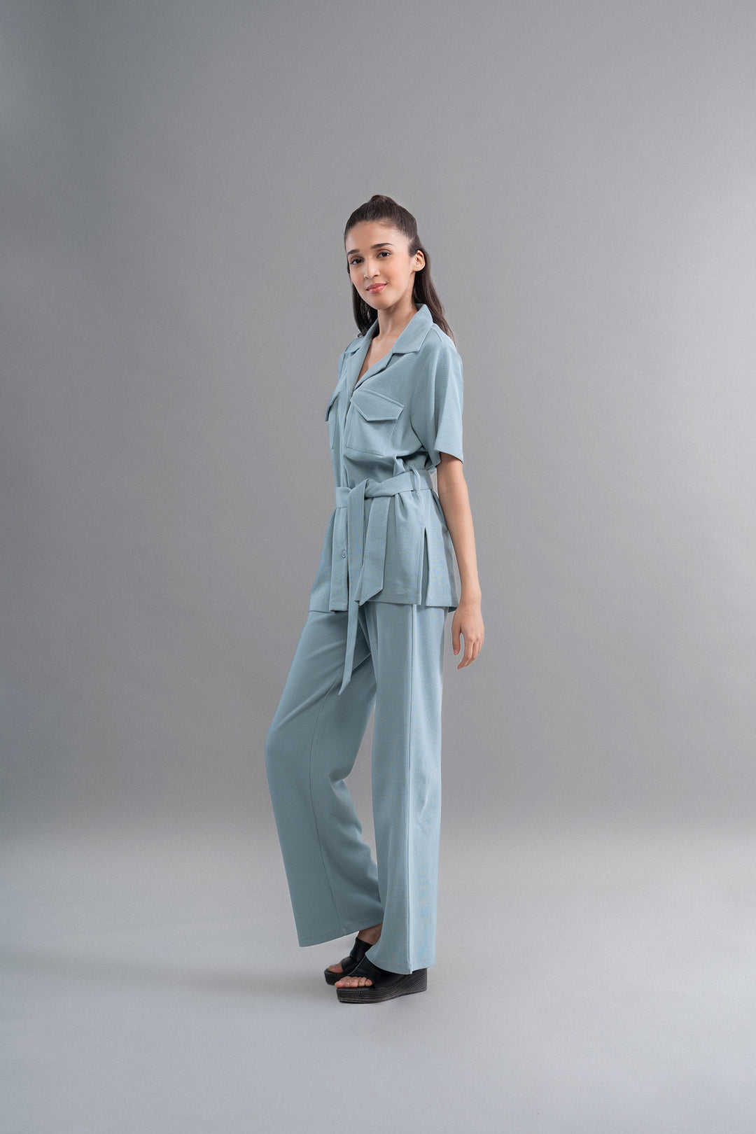 Model showcasing Safari Lushknit® 2.0 Aqua Shirt in light blue.