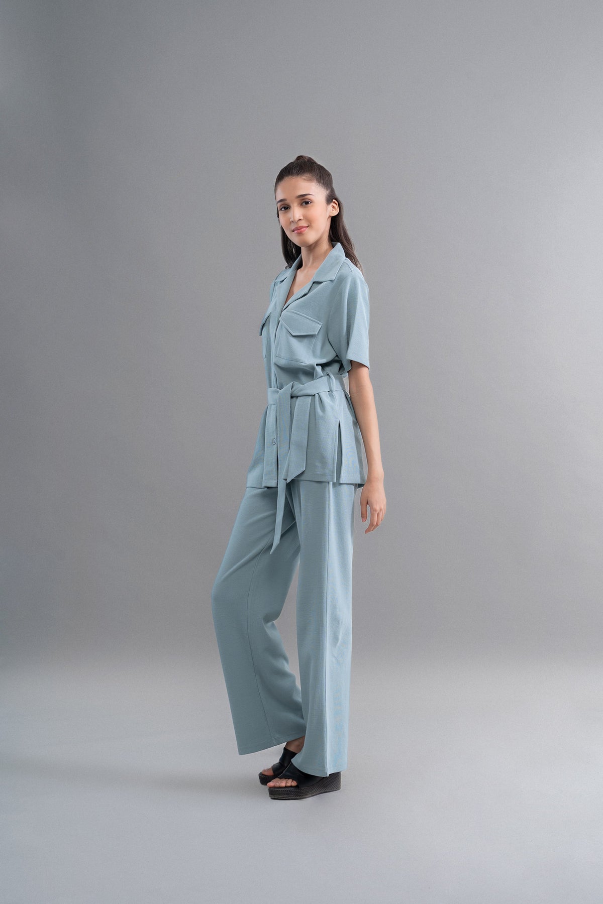 Model showcasing Safari Lushknit® 2.0 Aqua Shirt in light blue.