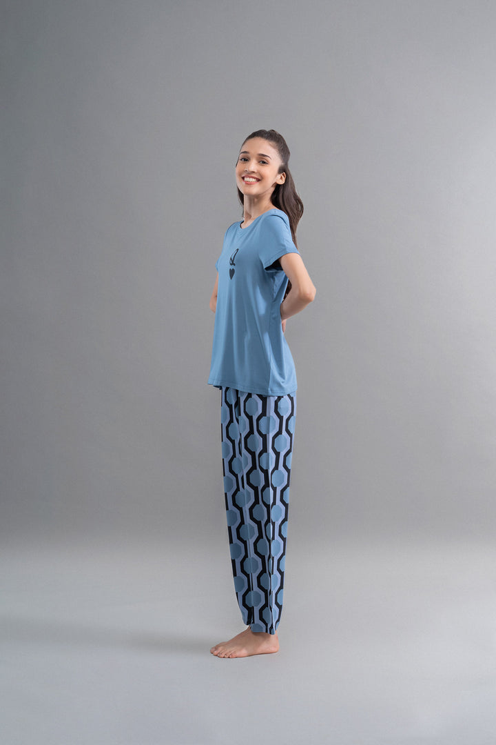 Q Heart Modal Round Neck Top model wearing stylish blue outfit.