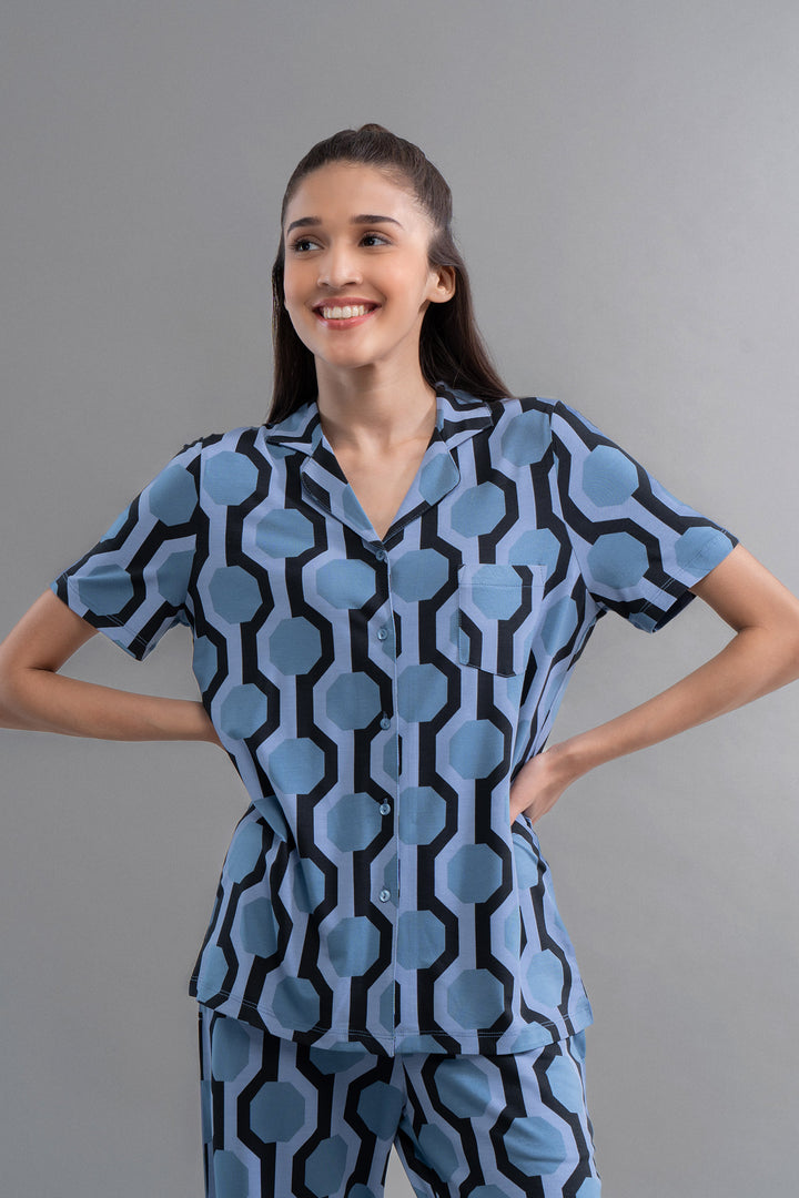 Midnight Blue Geometric Dream Pajama Set model smiling in stylish loungewear.
