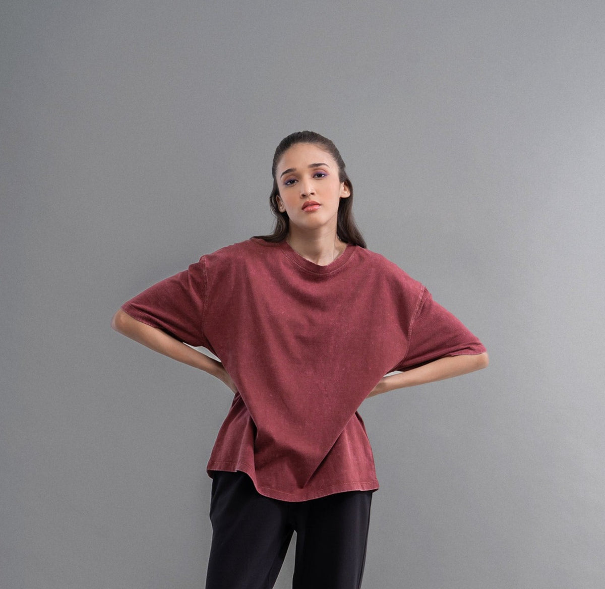 Acid wash unisex t-shirt on model with casual style.