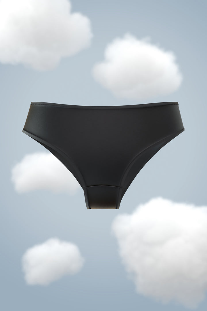 Supima Modal Hipster Nessies in black against a cloudy background.