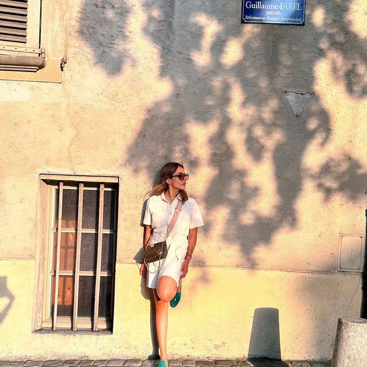 Model showcasing the Mini Waffle Ivory Safari Bermuda Set in sunlight.
