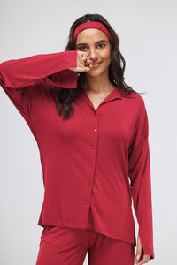 Romantic red button down shirt on a smiling woman.