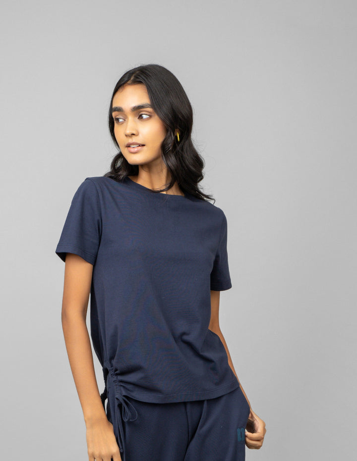 Cotton side ruched navy t-shirt styled for casual wear.