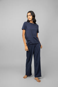 Navy Essential Flared Lounge Set modeled by a woman.