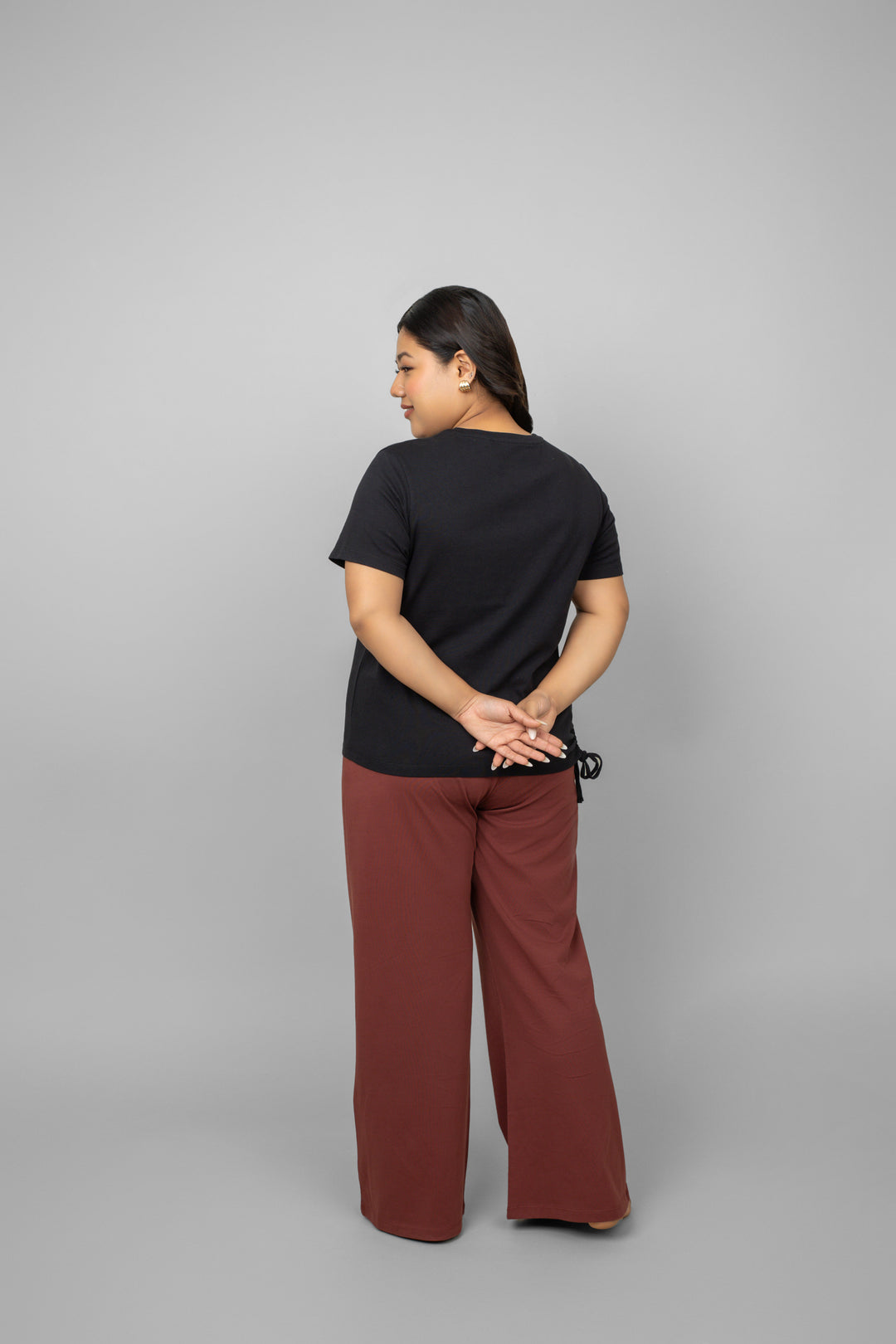 Ruby Essential Flared Lounge Set: stylish black top and brown pants.