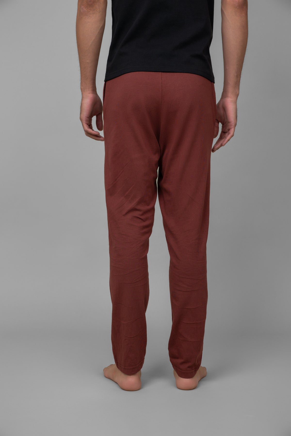 Burgundy men’s pajama pants, comfortable and stylish for relaxation.