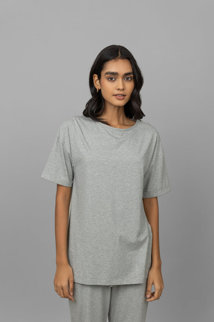 Grey melange cotton lycra pajama set with side slits for comfort.