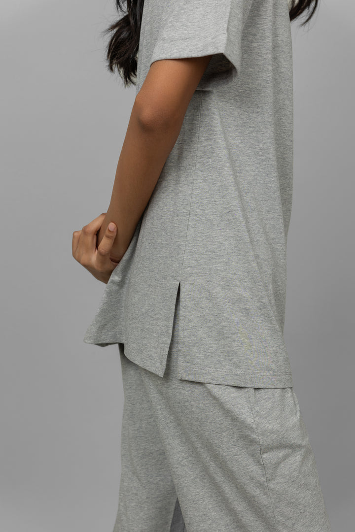 Grey melange cotton lycra pajama set with side slit detail.