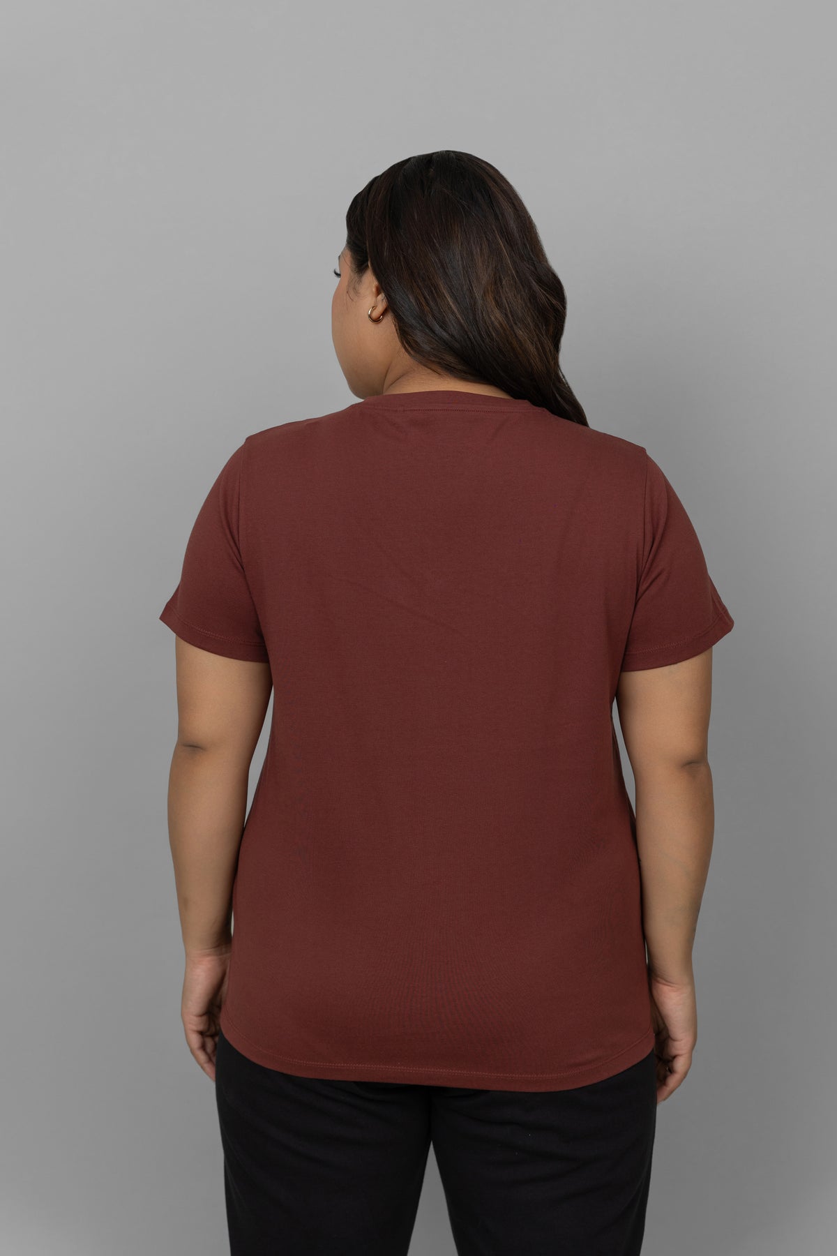Back view of rust v-neck tee for women.