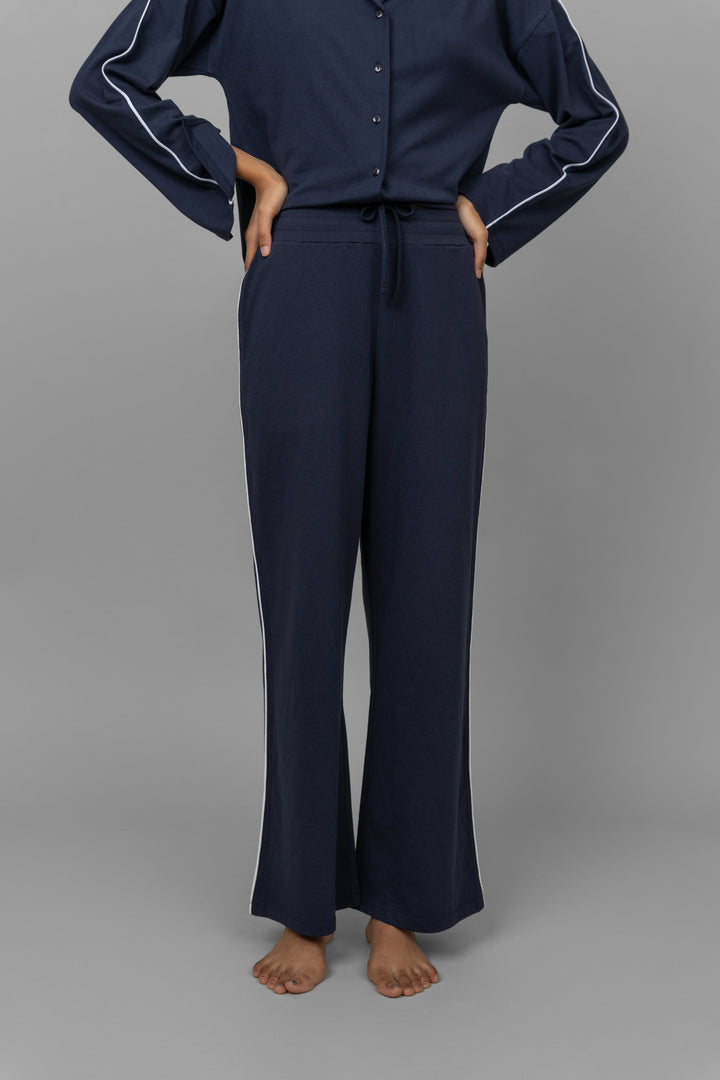 Navy button-down pajama set with white piping, comfortable loungewear.