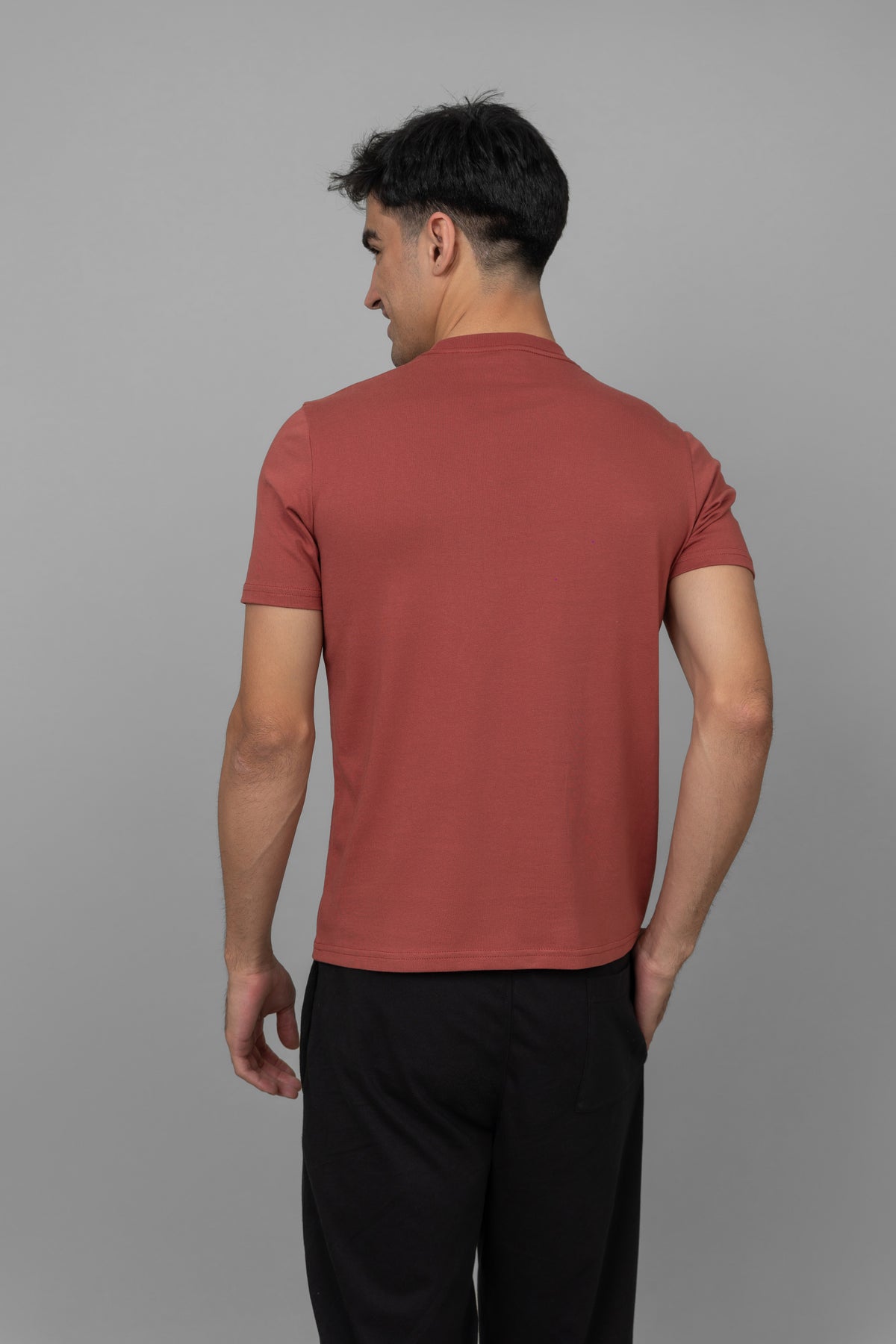 Rust men's essential t-shirt, back view, stylish casual wear.