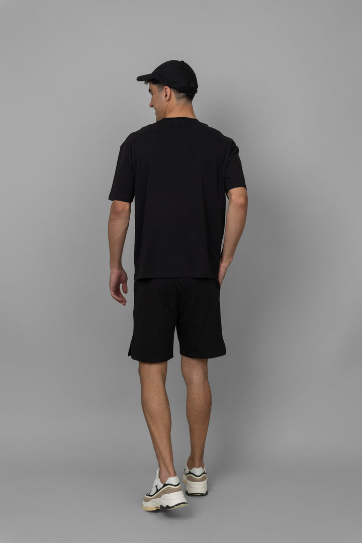 Black men's shorts set outfit, back view for casual style.