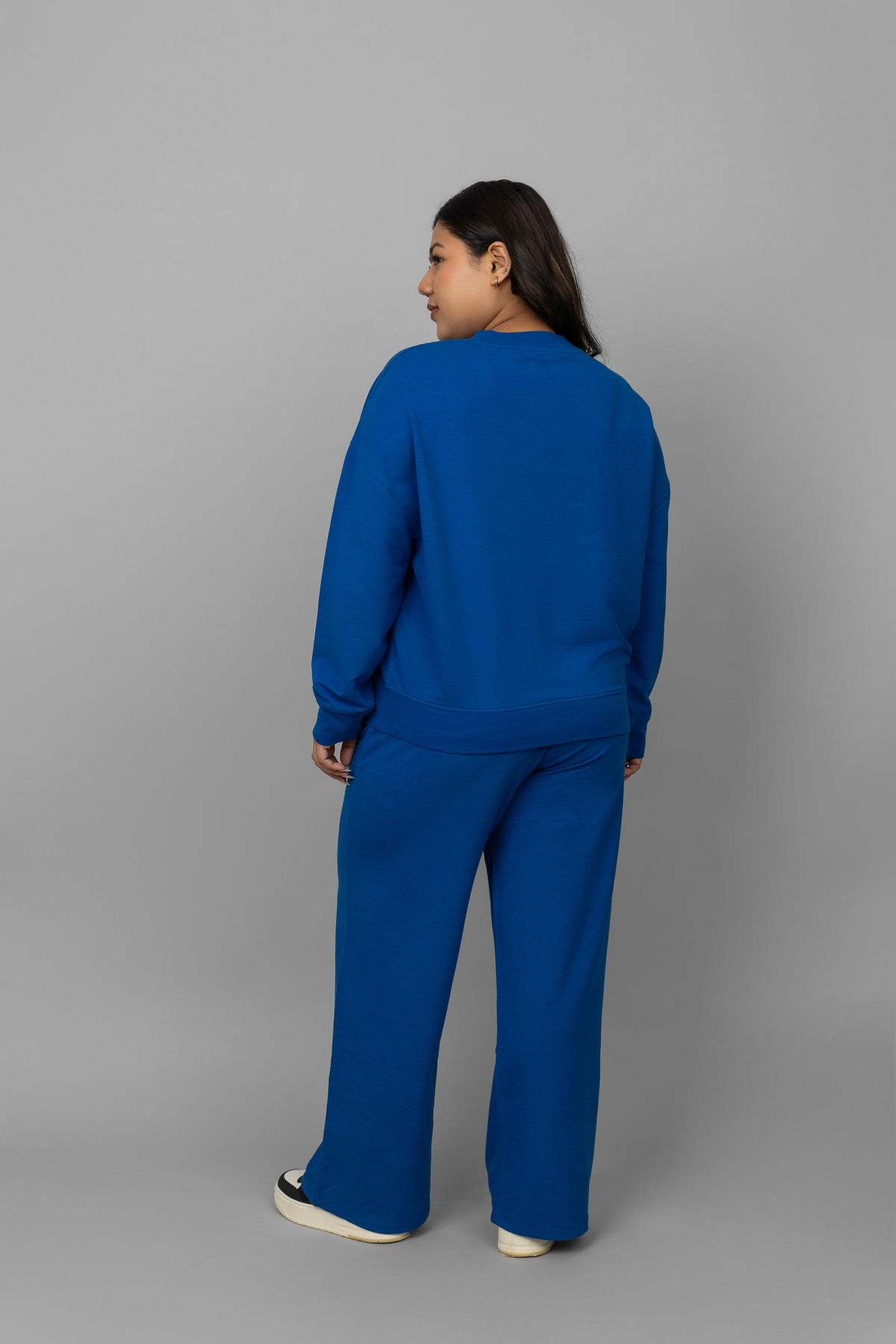 Blue bamboo terry travel pant paired with a matching top.