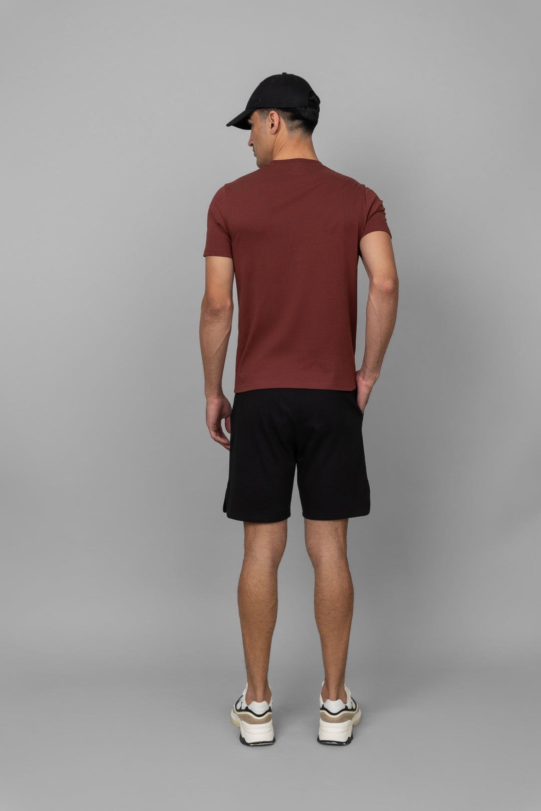 Rust men's shorts set with black shorts and matching tee.