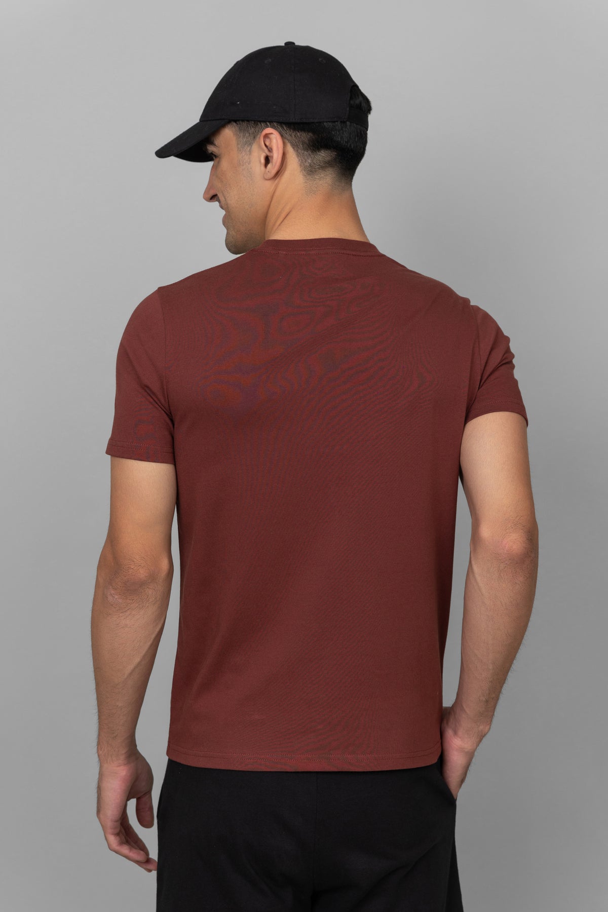 Shadow Red Men's Essential T-shirt, stylish and comfortable, worn by model.