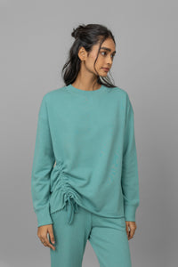 Cotton Terry Sweatshirt in teal with stylish gathered side detail.