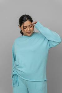 Sky blue cotton terry sweatshirt styled with a relaxed fit.