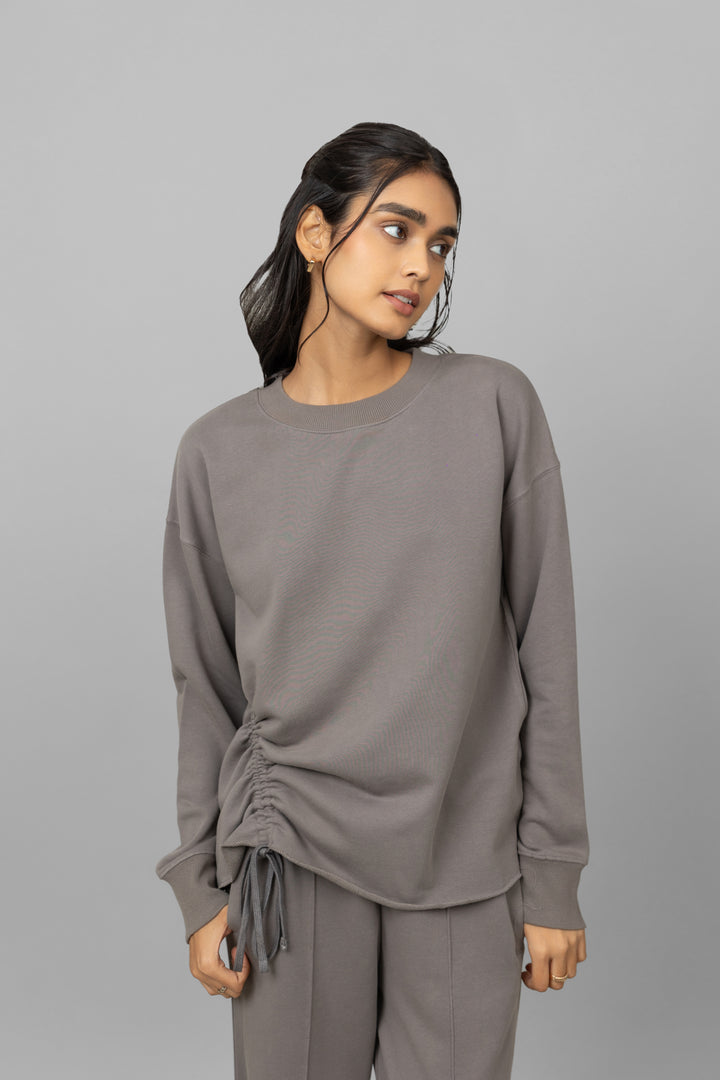 Grey cotton terry sweatshirt with stylish gathered detail.