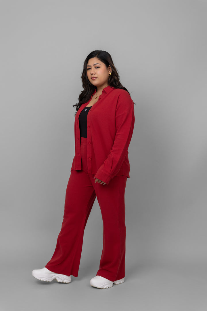 Red mini waffle multi-task pants styled with a matching cardigan.