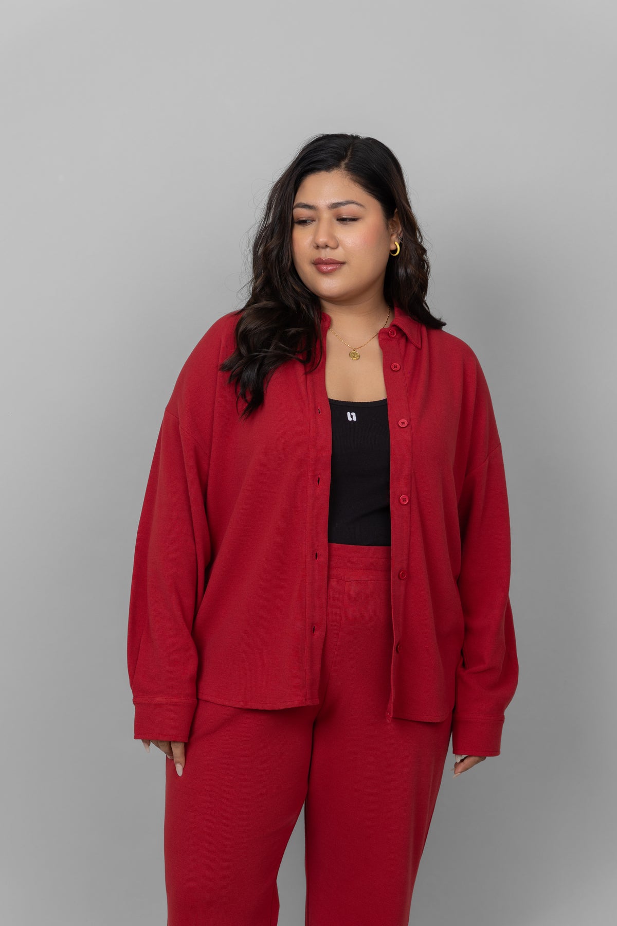 Red Mini Waffle MultiTask Shirt styled with matching red bottoms.