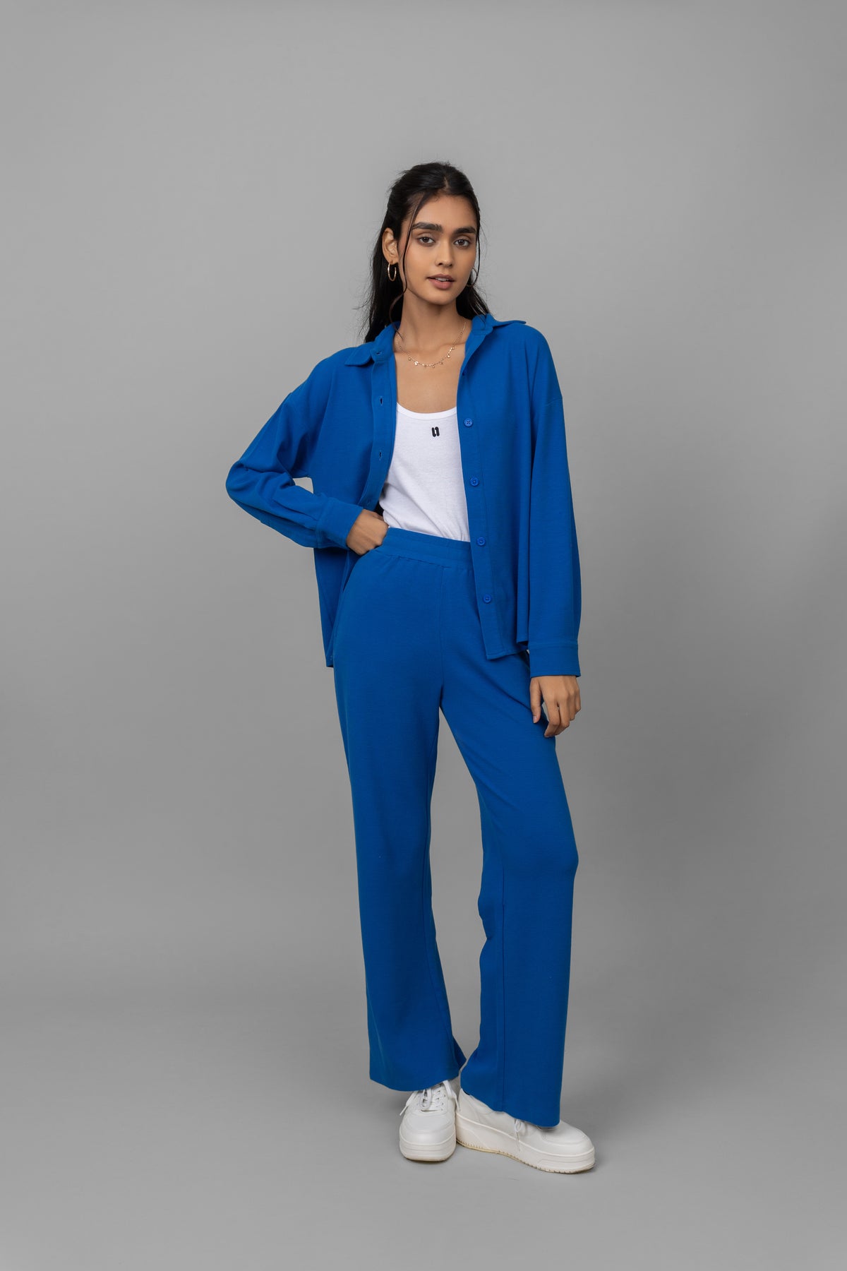 Blue Mini Waffle MultiTask Shirt styled with matching pants and sneakers.