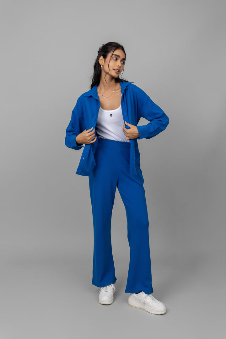Blue mini waffle pajama set model showcasing stylish comfortable sleepwear.