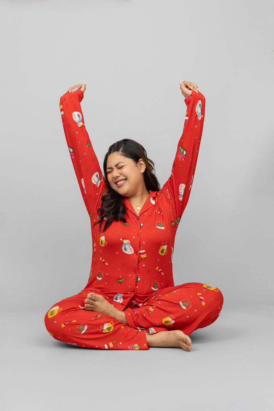 Christmas full sleeve button t-shirt in vibrant red with festive patterns.