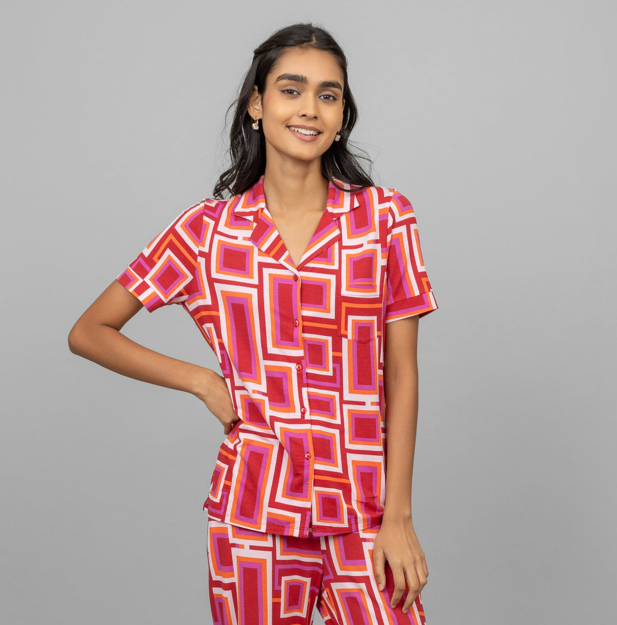 Zen Half Sleeve Button T-Shirt in vibrant geometric print on model.