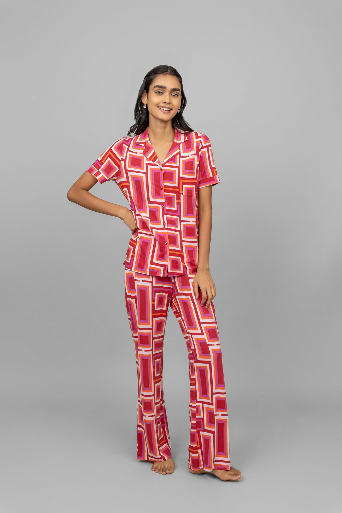 Red Zen Pajamas featuring a stylish geometric pattern on a model.