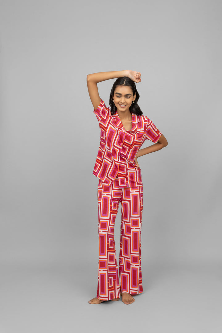 Trendy red Zen pajamas with geometric patterns for comfortable lounging.