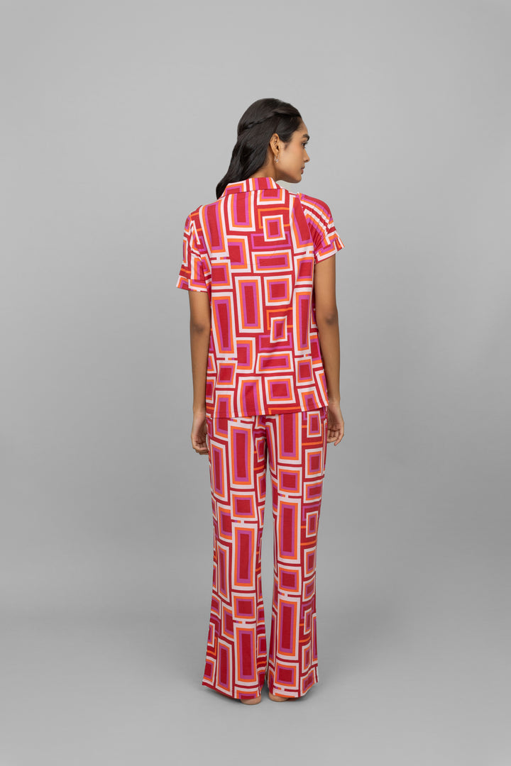 Red Zen Pajamas featuring a stylish geometric pattern, perfect for relaxation.