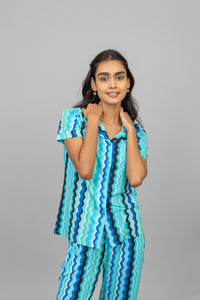 AquaWave Half Sleeve Button T-Shirt in vibrant blue pattern.