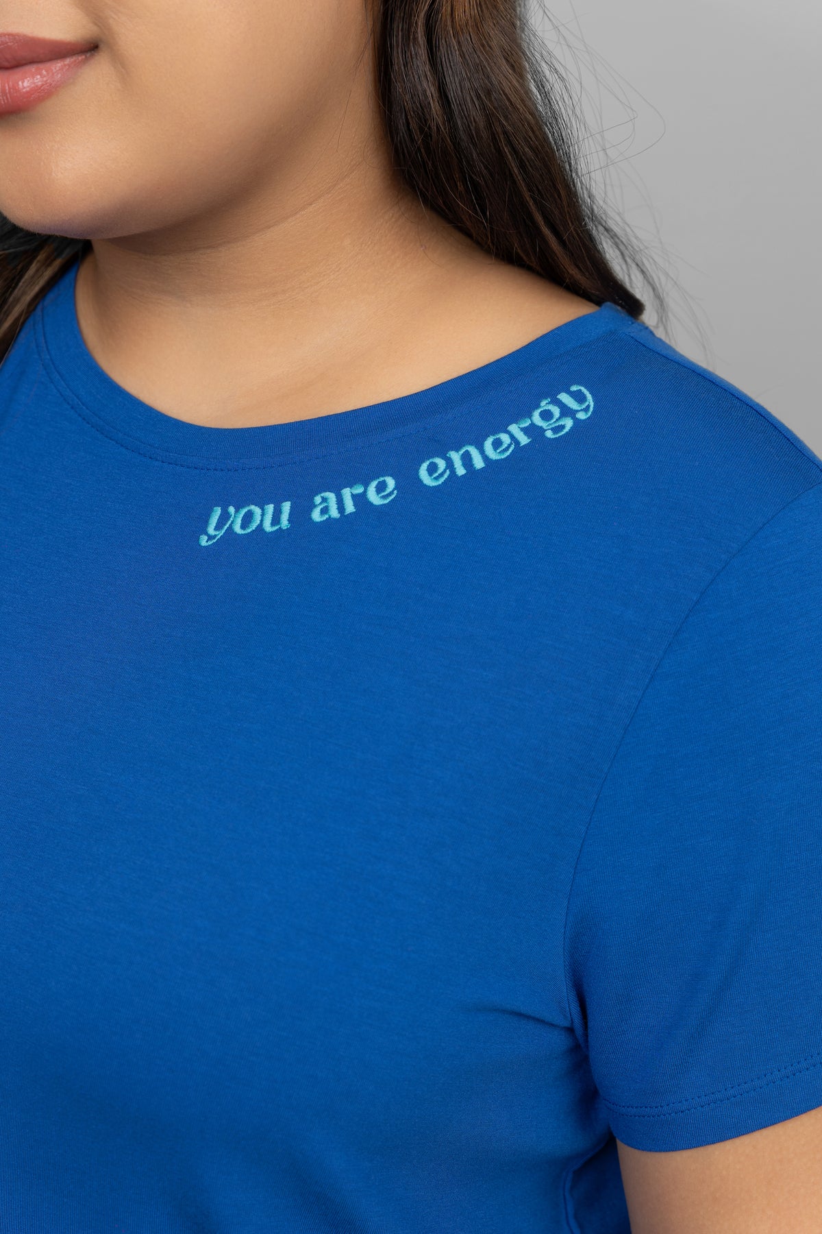 "You Are Energy T-Shirt with blue color and text design."