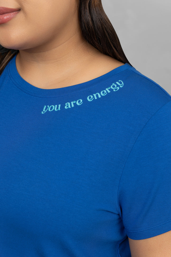 "You Are Energy Pajama Set in vibrant blue with inspirational text."