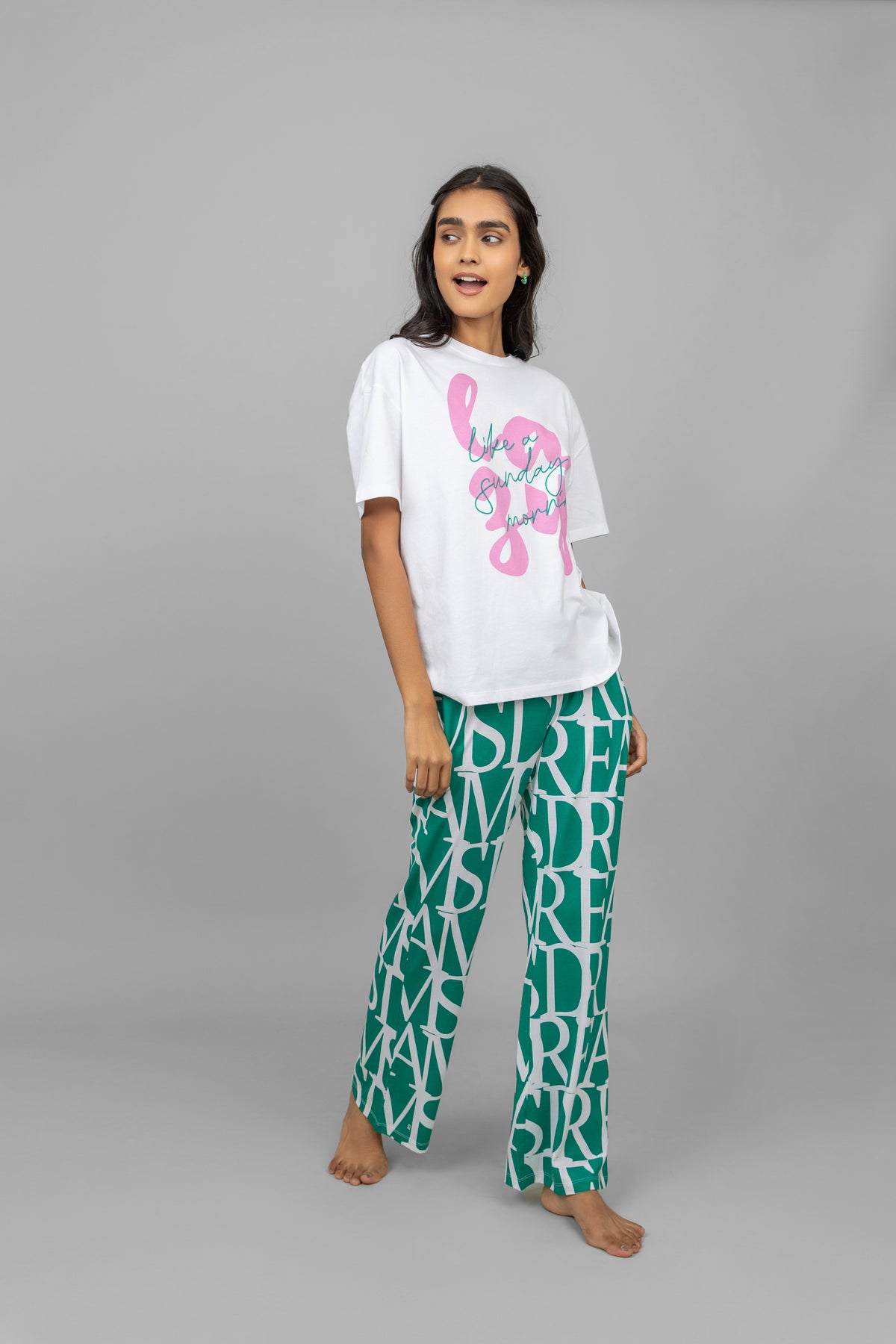 Fashionable woman wearing Dream Land Pajamas set, comfortable and stylish.