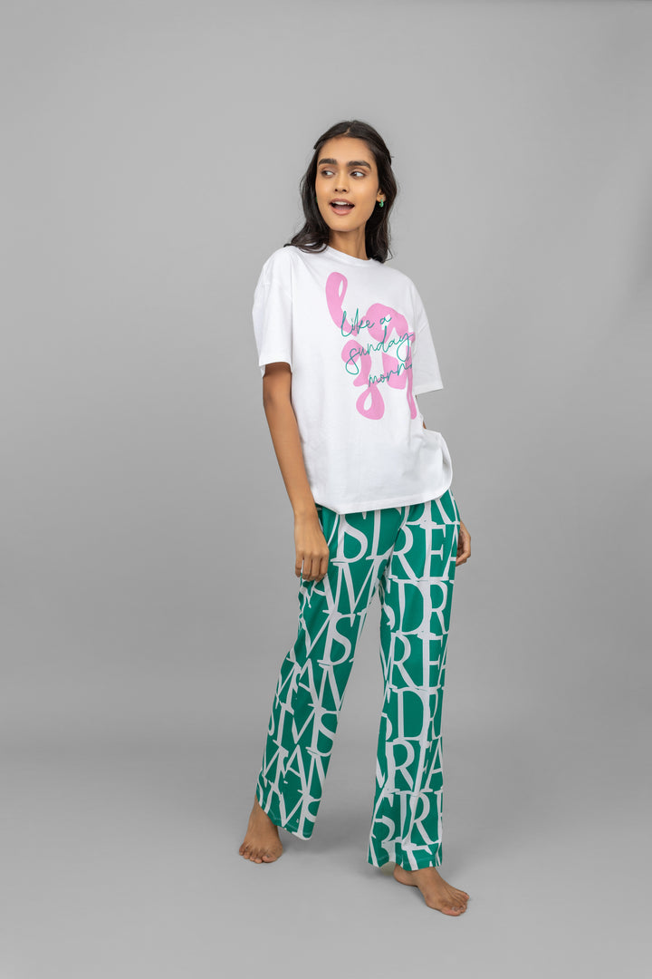 Fashionable woman wearing Dream Land Pajamas set, comfortable and stylish.