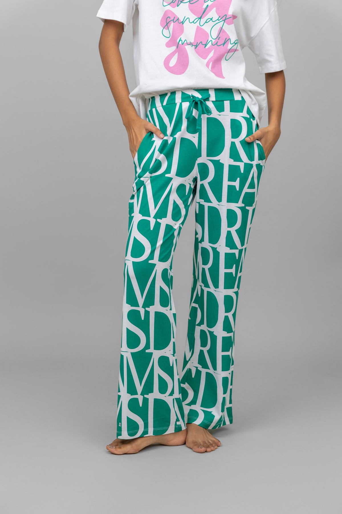 "Dream Land Pajamas in teal with stylish print for comfort."