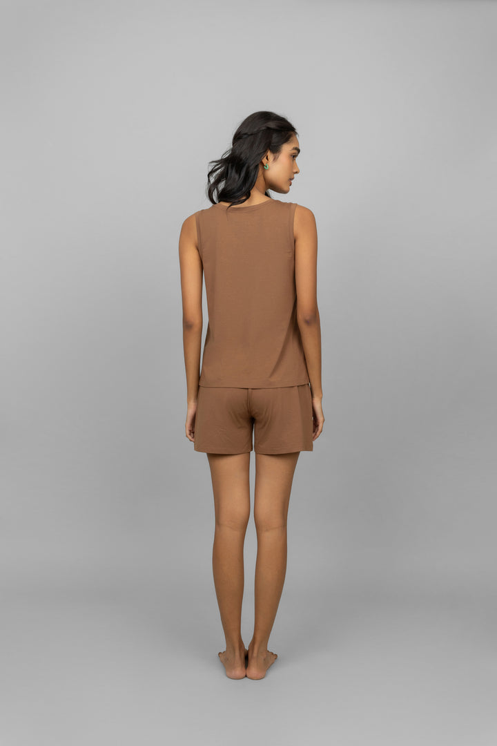 Home brown tank top worn with matching shorts, model from the back.