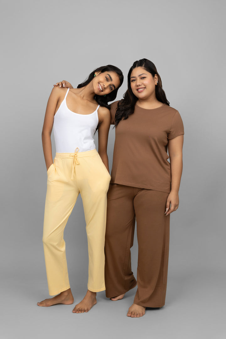Home Brown Supima Co-ord Set modeled by two women in casual outfits.