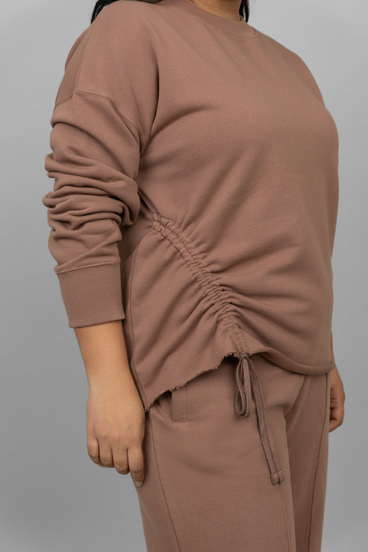 Brown terry ruched co-ord set featuring a stylishly gathered design.