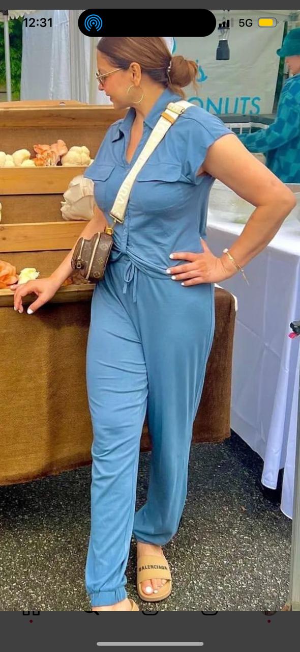 China Blue Supima® Jogger Set worn by woman at outdoor market.