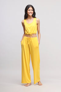 Sunny Lime Supima® Co-ord Set with a smiling model in yellow.