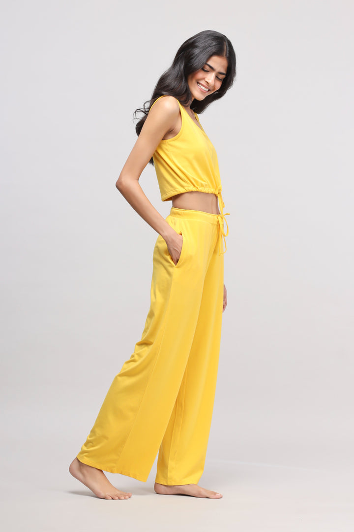 Sunny Lime Supima® Co-ord Set featuring a model in yellow outfit.