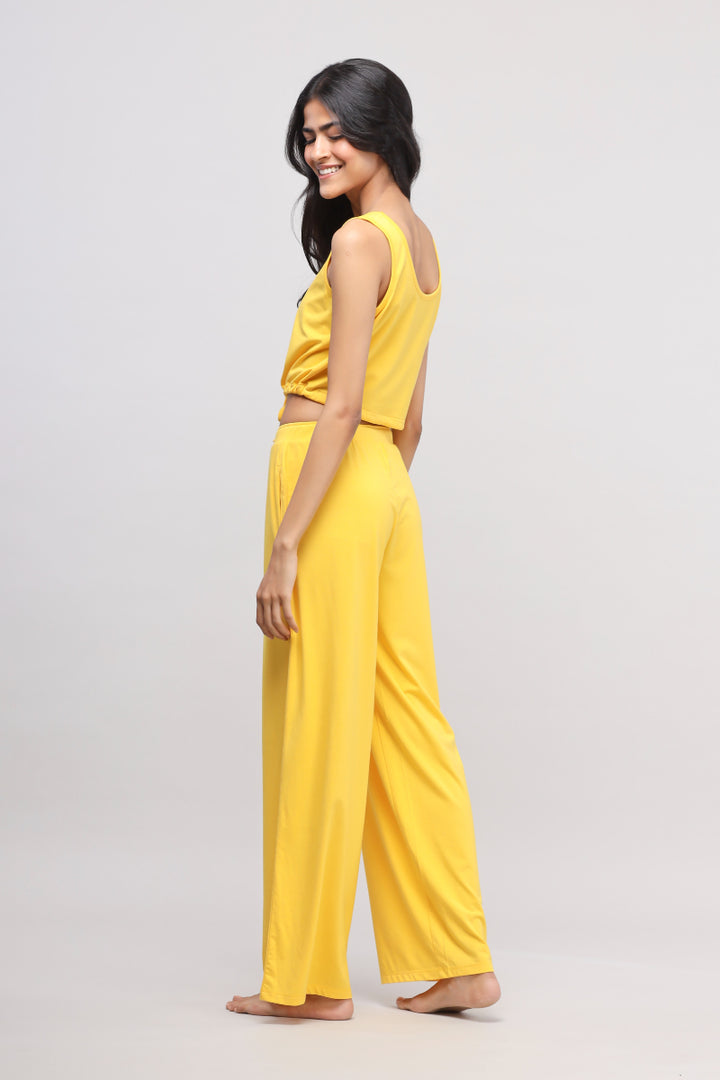 Sunny Lime Supima® Co-ord Set model in yellow outfit, showcasing effortless style.